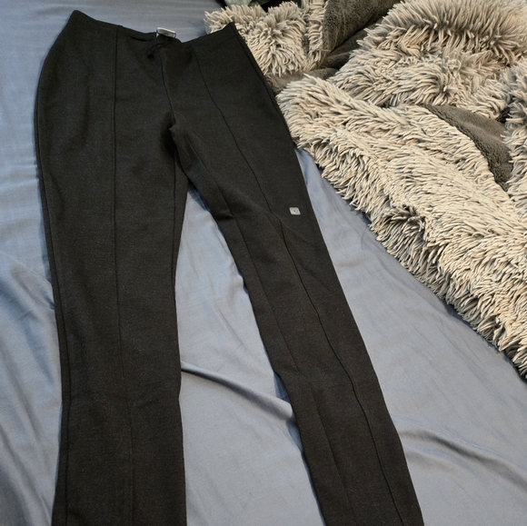 Express Black leggings with permanent crease down the leggings and back of legs. - Picture 5 of 5